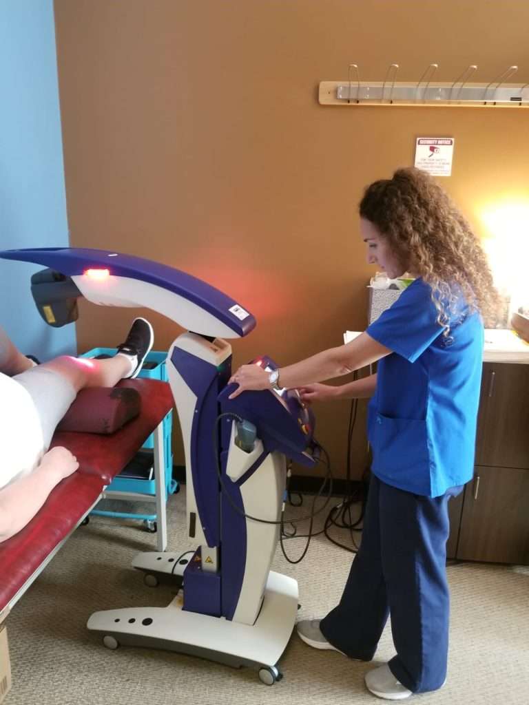 MLS laser therapy treatment being administered at Cobblestone Spine and Joint Institute in Royal Palm Beach, FL